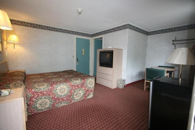 Executive Inn Orange Habitación foto